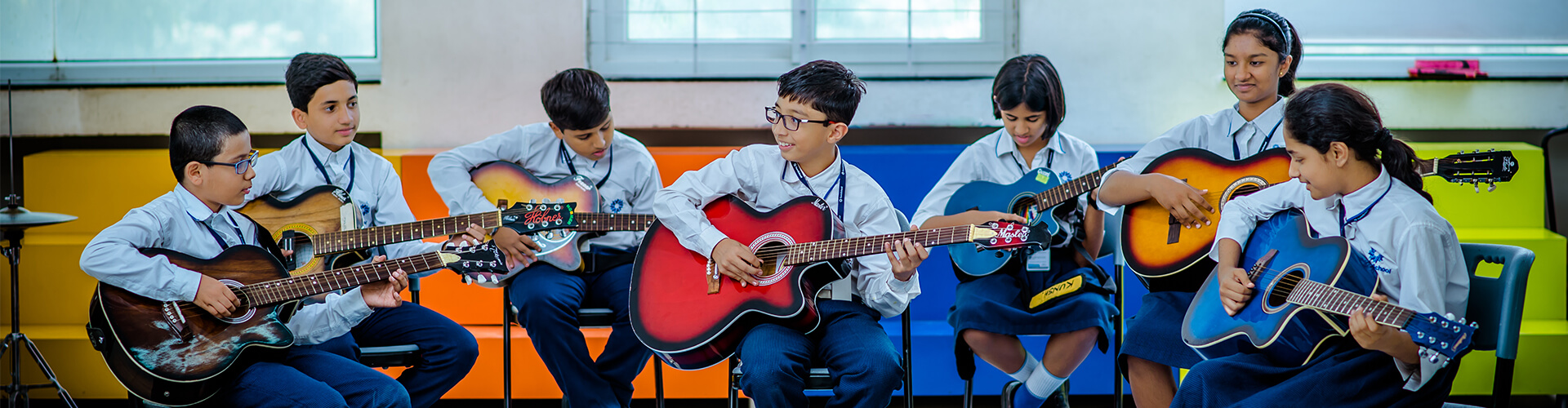 Children Playing Guitar- Lighthouse Learning